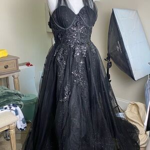 Black ball gown! PADDED with a slit ❤️ fits a size 4 comfortably!